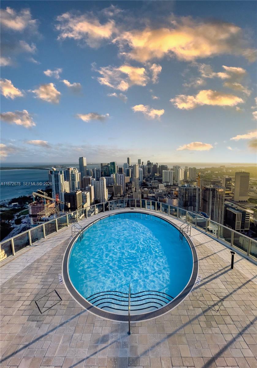 Paramount rooftop pool with Miami skyline at sunset
